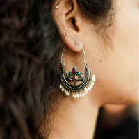 This stunning set with its one of a kind pieces is extremely versatile, a styling delight and truly exotic. Taking notes from the tribal moods of India, the jewellery is crafted in german silver with oxidised silver finish for a classic appeal. Wear them separately or all together , this gift set is a stylist's delight.