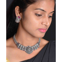 Adorn your beautiful personality with this exquisitely designed and handcrafted necklace ( set of 5) in high quality German Silver. Pair it up with any casual,semi formal or formal attire for that traditional yet contemporary look.This beautiful jewellery set includes Ghungroo choker, pair of earrings, bracelet, nosepin and a ring.Amazing quality