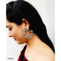 Long oxidized necklaces are not only tasteful, but also trendy. They are a good fit for a casual look. This long necklace set from Vastrabhushan is a classic piece of German silver Indian jewelry. The necklace is studded with tiny ghungroo clusters that give it a boho hippie look. Pair it with a traditional kurta, and you are ready to go. If you are obsessed with ghungroo, then this is the piece for you. It adorns your neck beautifully, with intricate yet minimalistic designs. Grab this piece of