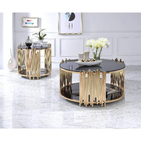 HomeRoots Glass, Metal 25  X 25  X 22  Black Glass and Gold End Table