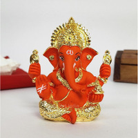 Gold Art India Mukut Ganesha Statue Gold Plated | Car Dashboard | Office Desk/Home Dcor | Gifting | House Warming | | 150g | 3.3 Height | (4HANDMUKUTGOLDORANGE)