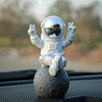 Street27 Astronaut Figurine Showpiece for Home Dcor Idols for Office Desk Table Astronaut Toy for Car Dashboard, Statue for Gift Gifting Items Birthday Decoration (Sitting on moon Silver)