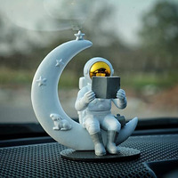 Street27 Astronaut Figurine Showpiece for Home Dcor Idols for Office Desk Table Astronaut Toy for Car Dashboard, Statue for Gift gifting items Birthday Decoration (Reading on Moon - Golden)