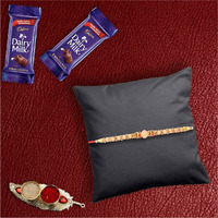 Astonished Retail Premium Sukhad Rakhi with 2 Pieces Dairy Milk Chocolates | Rakhi Chocolate Gift for Brother | Roli, Chawal, Chandan, Misri | 56