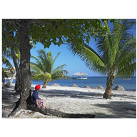 Tourist resting under palm trees on beach at Palmetto Bay, Roatan Island, Honduras-Paper Art-18&quotx14"