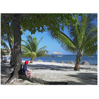 Tourist resting under palm trees on beach at Palmetto Bay, Roatan Island, Honduras-Paper Art-26"x20"