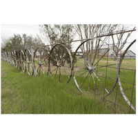 A fence made of wagon wheels near Schulenburg in Fayette County, TX-Paper Art-26"x18"