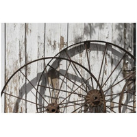 Old wagon wheels against a shed in Buffalo Gap Historic Village, near Abilene, TX-Paper Art-32"x22"