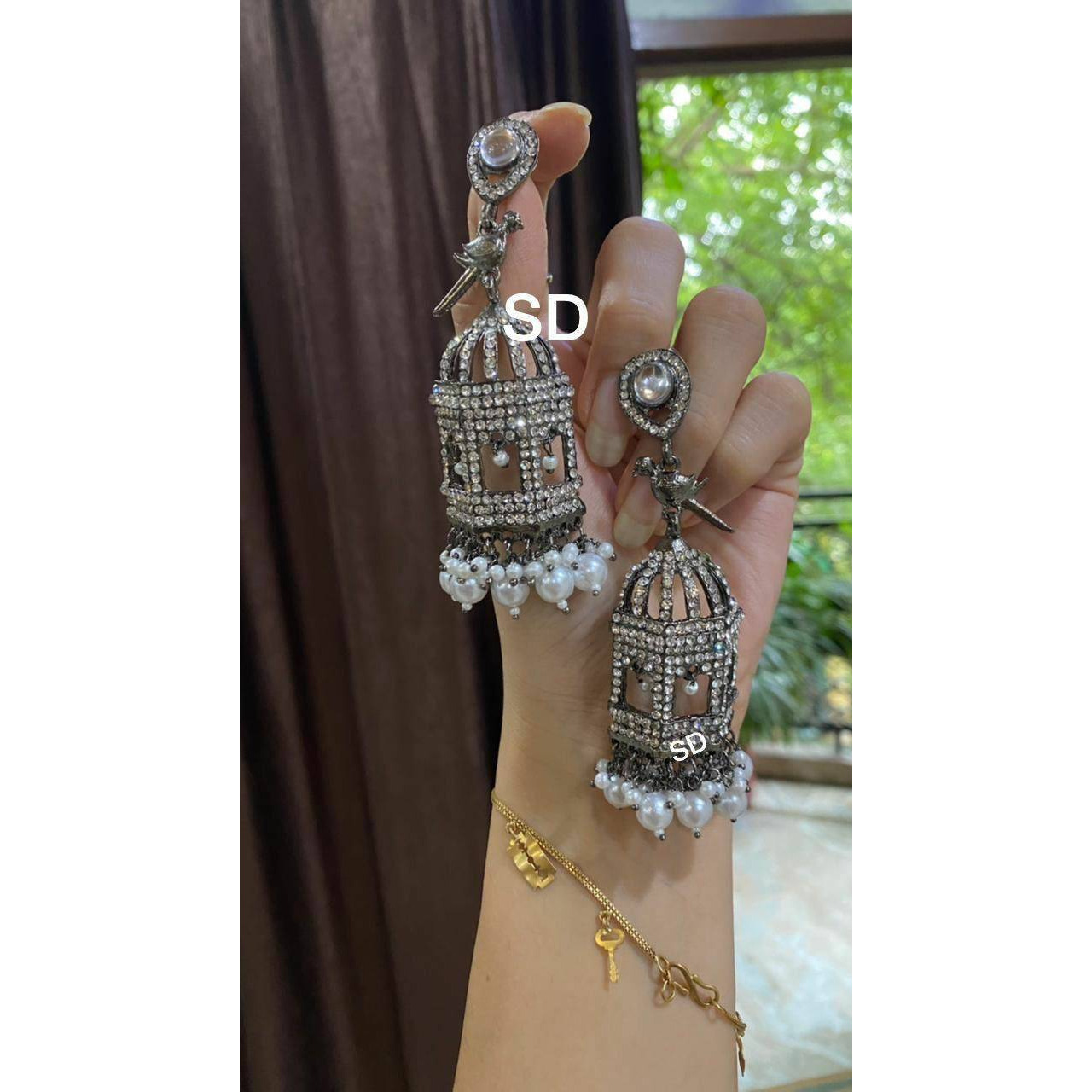 *New Collection* Long Haram & Short Choker combo with beautiful Jhumka Earrings, Ring, Nosepiece, toe ring and Premium Quality Bangles *Adorn your beautiful personality with this exquisitely designed and handcrafted necklace in high quality German Silver. Pair it up with any casual,semi formal or formal attire for that traditional yet contemporary look.Premium quality