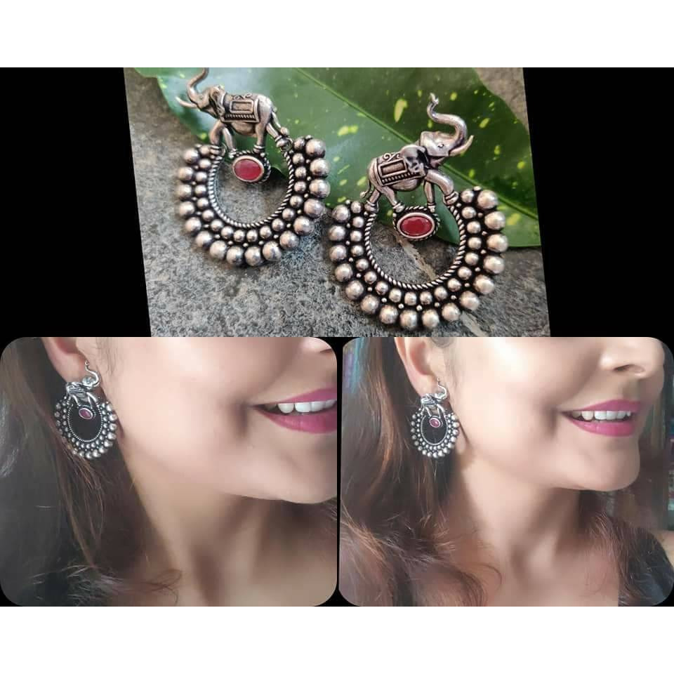 Premium qualityStep out in style with this beautiful oxidised silver plated earrings, which have been given a drop designer dangler perfectly designed. It will add bling to your look. This earring will go well with any of your ethnic outfits.