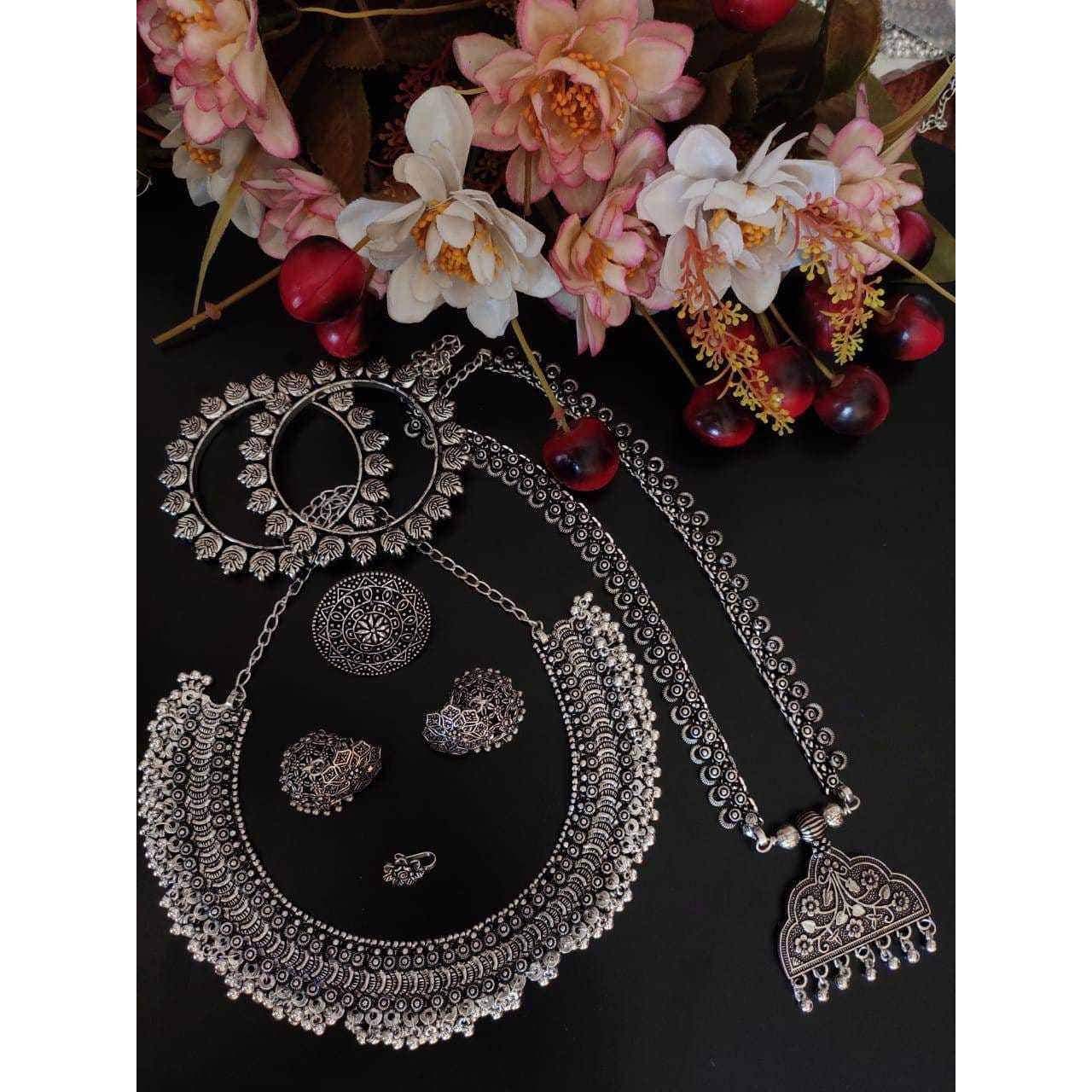 This beauty set of 6 includes long necklace, short necklace, ring, nose pin, bracelet and pair of earrings. Shop this unique antique looking set handcrafted with love by the experienced craftsmen just for you. you can pair the set with ethnic attire as well as casual to have a statement fusion look.Premium quality!!