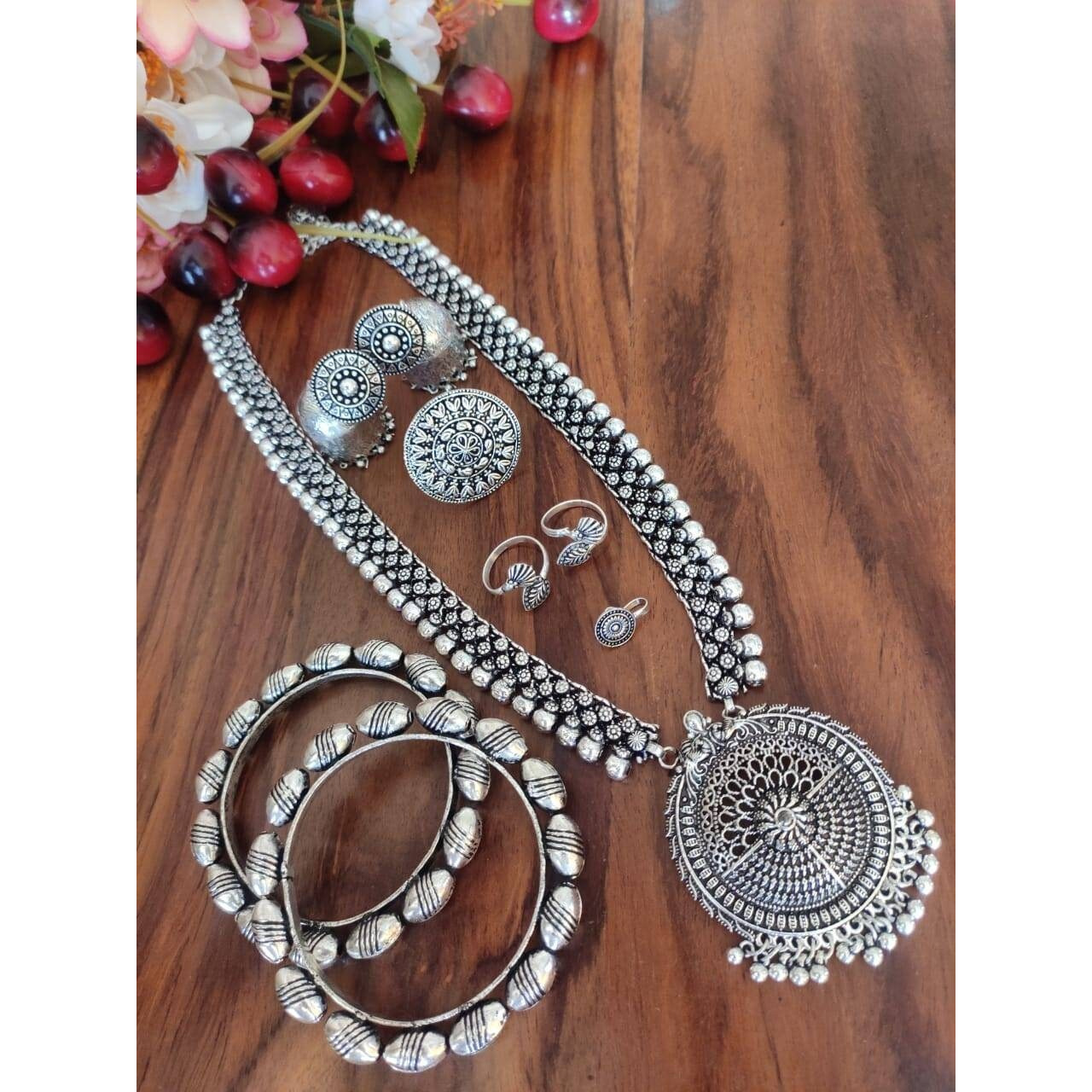 Indian Jewellery, Oxidised Ethnic Jewellery Set, Jhumka Ghunghroo Set, Silver Look Jewelry, Boho Hippie, Long+ Short Haram, Gifts For HerThis beautiful jewelry set recreates the opulence of Indian beauty in the best and most justified manner. Our Silver Oxidised Necklace set is a head-turner with lovely traditional aesthetics that makes its way to a must-have! Add the perfect amount of drama to any simple and sober look, and you will be all ready to set the floor on fire with your looks!DetailsH