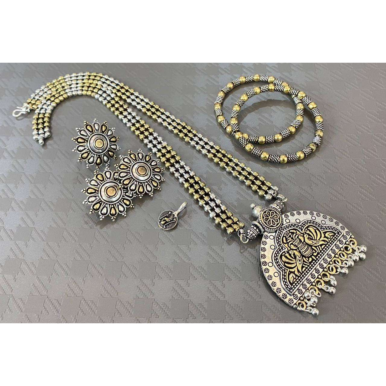 Impressively detailed and elaborate- this long necklace and earrings set with these beautiful and delicate petal motifs studded with stones are versatile enough to justify everyday or occasion dressing. Find your inner gypsy vibe and express with style these statement jewels.Wear together or separately.