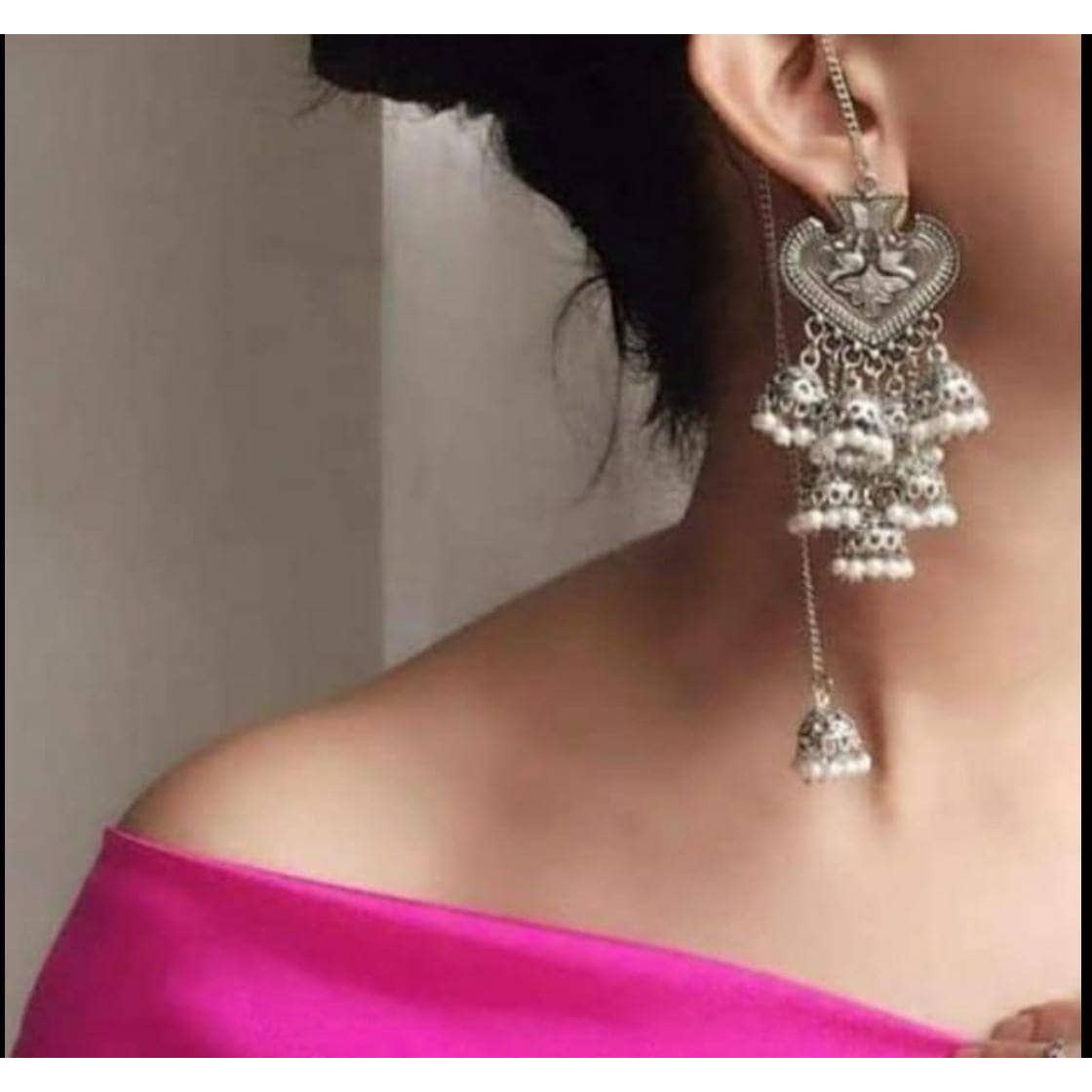 Add ethnicity and elegance to your beautiful personality with these exquisitely designed handmade earrings with pearls drop. The intricate designs gives these earrings a very classy touch. Wear them with any semi formal or casual attire and gather compliments all the way!