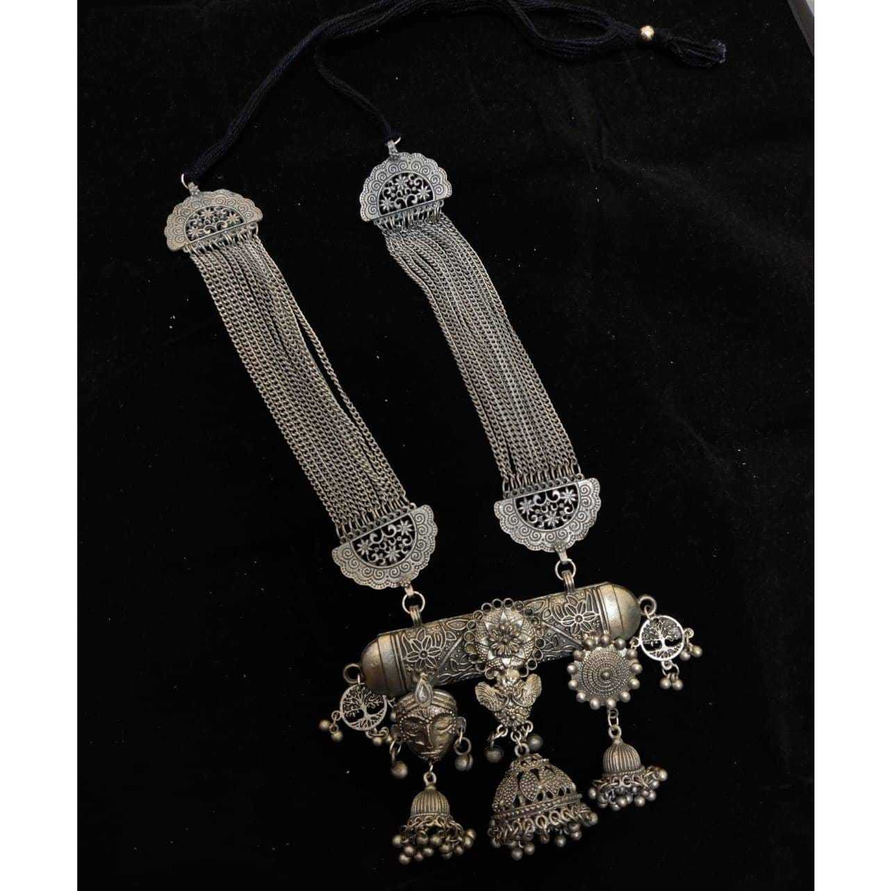 Adorn your beautiful personality with this exquisitely designed and handcrafted necklace in high quality German Silver. Pair it up with any casual,semi formal or formal attire for that traditional yet contemporary look.Premium quality