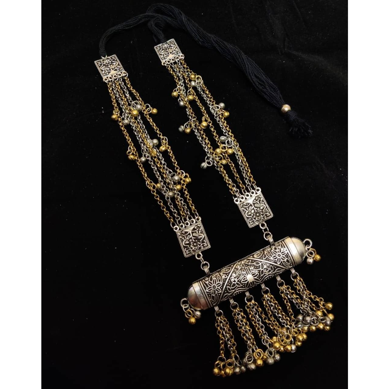 Adorn your beautiful personality with this exquisitely designed and handcrafted necklace in high quality German Silver. Pair it up with any casual,semi formal or formal attire for that traditional yet contemporary look.Premium quality