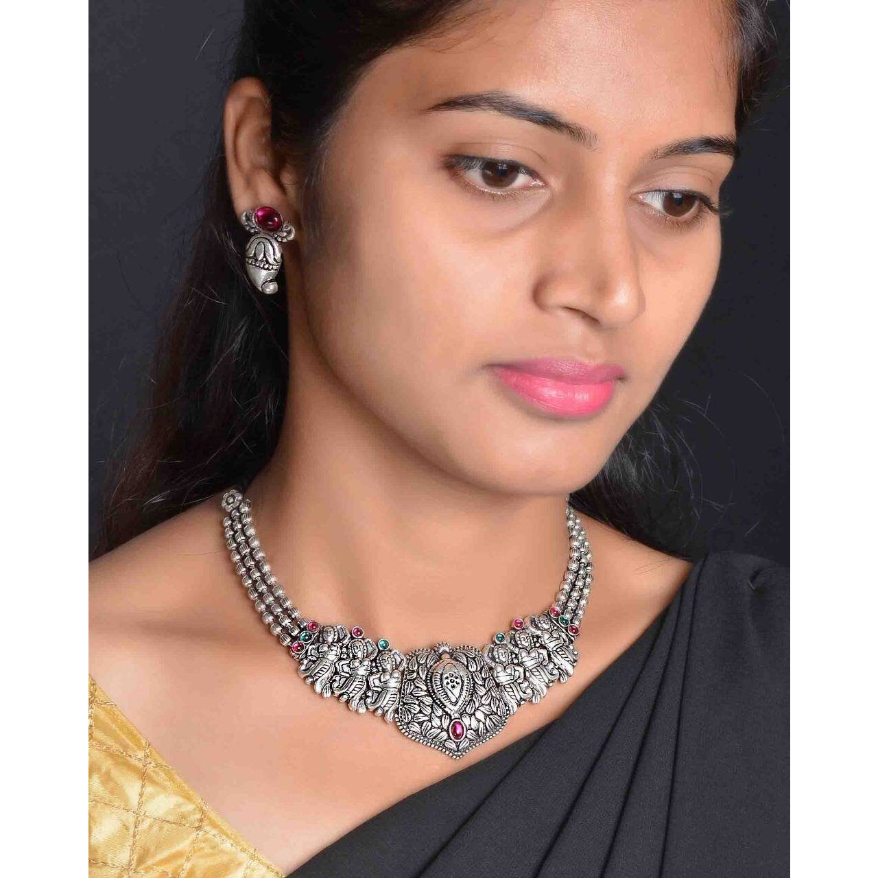 Adorn your beautiful personality with this exquisitely designed and handcrafted necklace ( set of 5) in high quality German Silver. Pair it up with any casual,semi formal or formal attire for that traditional yet contemporary look.This beautiful jewellery set includes Ghungroo choker, pair of earrings, bracelet, nosepin and a ring.Amazing quality