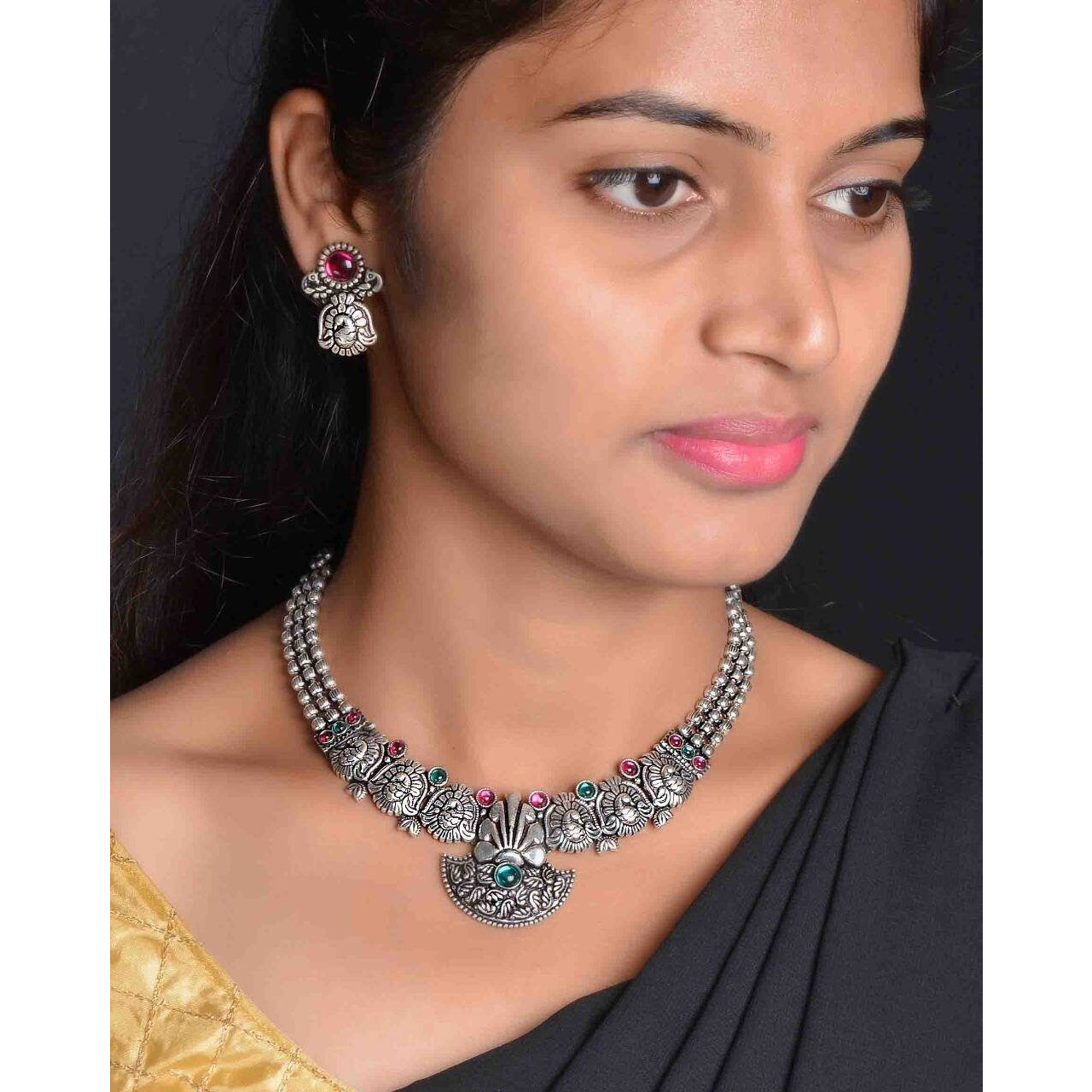 Adorn your beautiful personality with this exquisitely designed and handcrafted necklace ( set of 5) in high quality German Silver. Pair it up with any casual,semi formal or formal attire for that traditional yet contemporary look.This beautiful jewellery set includes Ghungroo choker, pair of earrings, bracelet, nosepin and a ring.Amazing quality