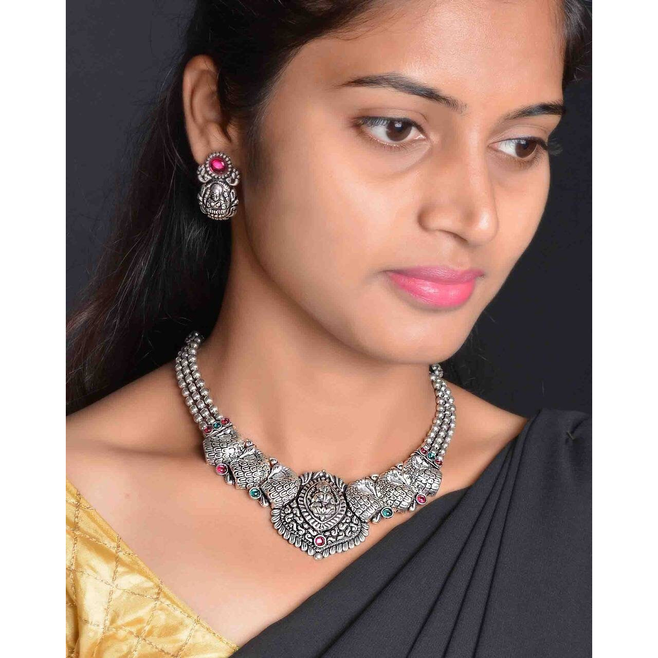 Adorn your beautiful personality with this exquisitely designed and handcrafted necklace ( set of 5) in high quality German Silver. Pair it up with any casual,semi formal or formal attire for that traditional yet contemporary look.This beautiful jewellery set includes Ghungroo choker, pair of earrings, bracelet, nosepin and a ring.Amazing quality