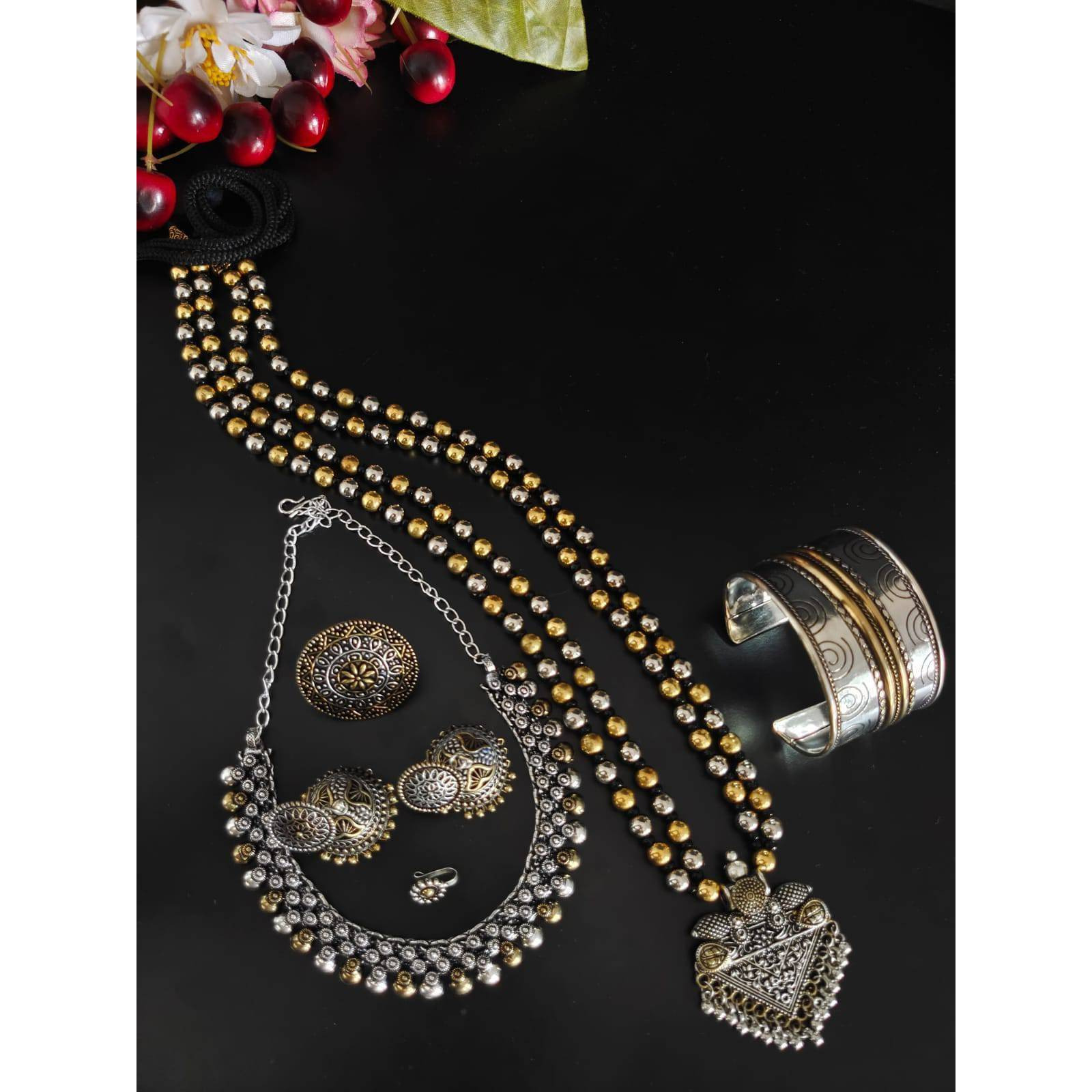 Dramatising the classic hoop style of earrings, is this gorgeous pair of earrings that boasts of striking detail with ghungroo hangings.. Glamorous yet effortless, these hoops are real keepers for souls who are looking for a classic yet versatile piece of jewelry. The kind of jewelry that adds oomph to your casual wear and also matches the edge of your occasion special Indian Wear.