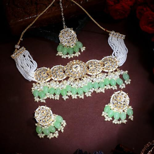 Gehena by Estele Gold Plated Elegant Designer Kundan Studded Necklace set with Maang Tikka and Mint Green Pearl Beads for Girls and Women