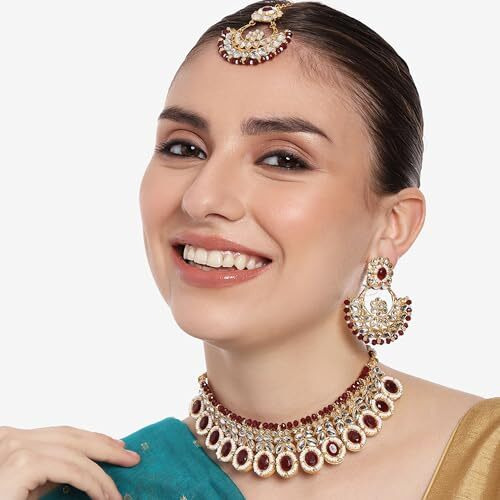 Gehena by Estele Gold Plated Resplendent Designer Ruby Studded Crystals with Cluster Beaded Choker Necklace Set and Maang Tikka for Girls and Women