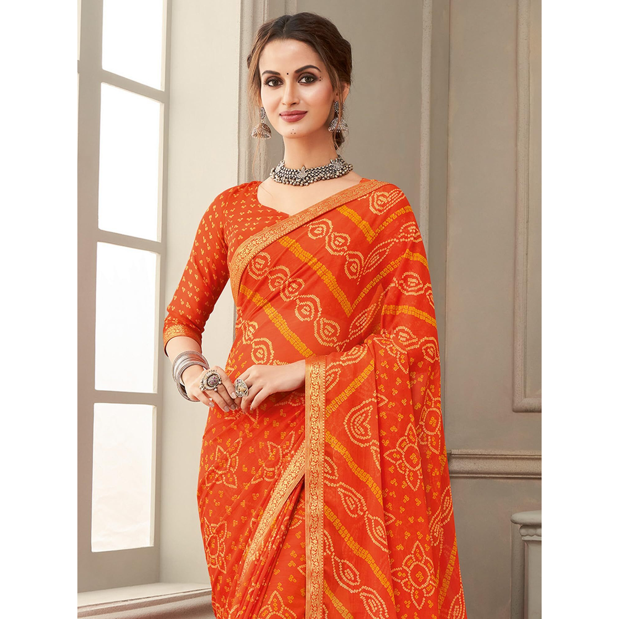 AKHILAM Womens Chiffon Orange Embellished Designer Saree With Blouse Piece (SIMAYA12905B_TFH)