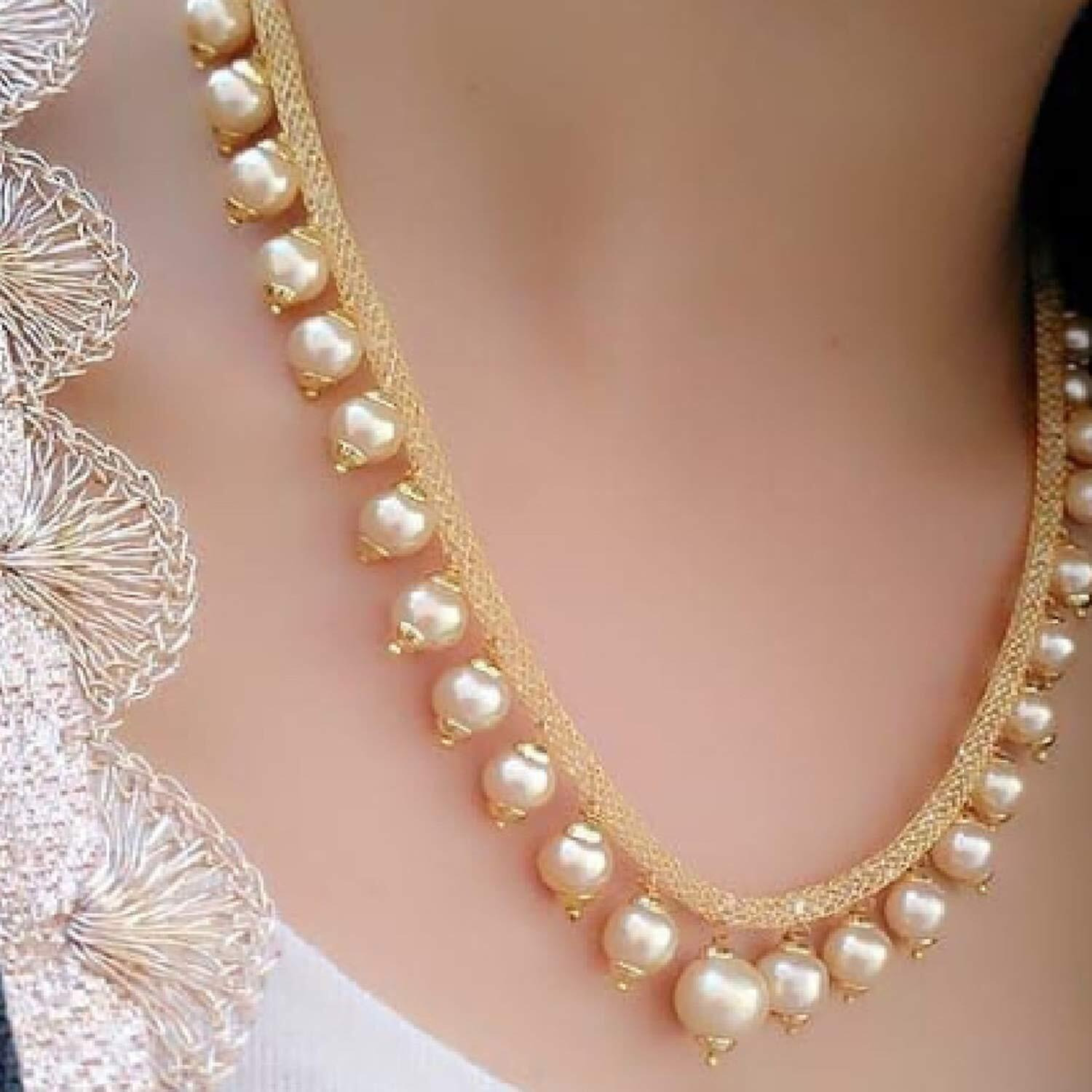 Sukkhi Adorable Gold Plated Wedding Jewellery Pearl Choker Necklace Set For Women (N82087_D1)