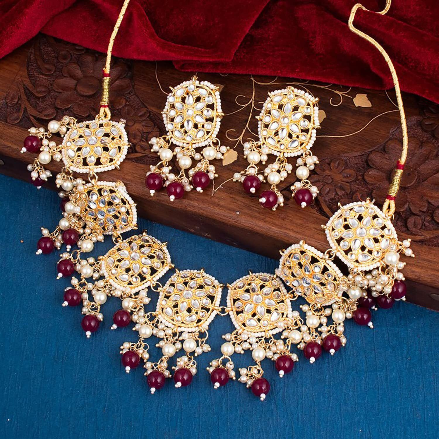 Sukkhi Attractive Gold Plated Kundan & Pearl Collar Necklace Set For Women (NS101499)