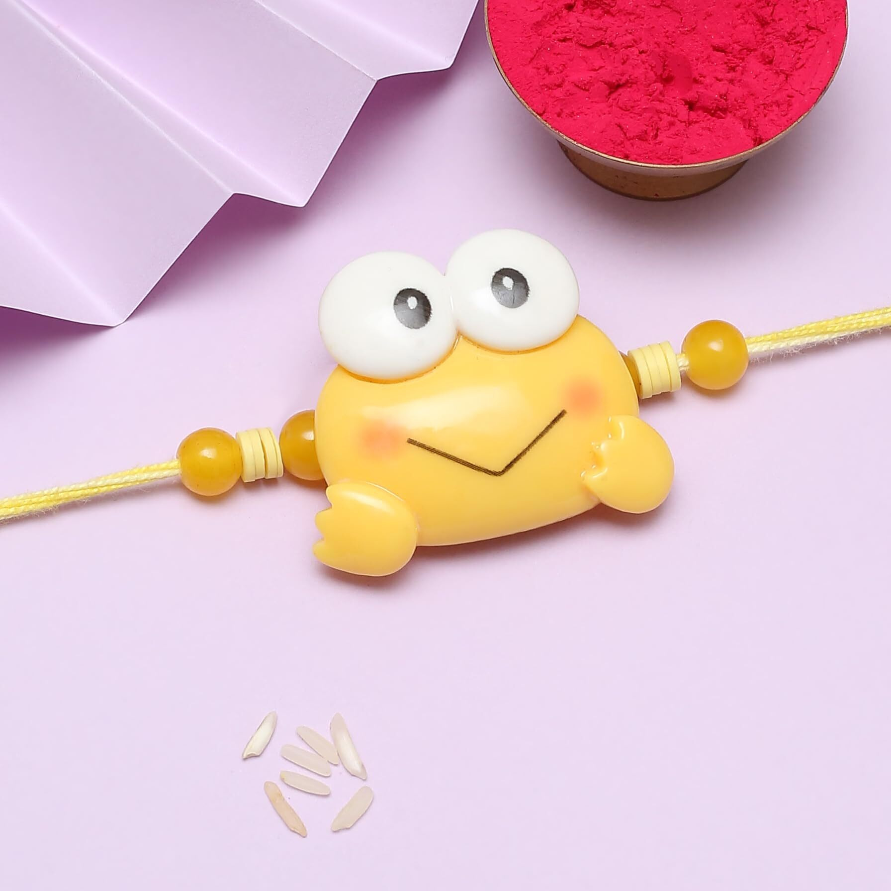 The Purple Tree Cute Yellow Frog Rakhis For Kids with Roli Chawal and Card (Pack of 1) Rakhi for bhai, Rakshabandhan Gift for Kids, Rakhi Gift, Cute Froggo Rakhi