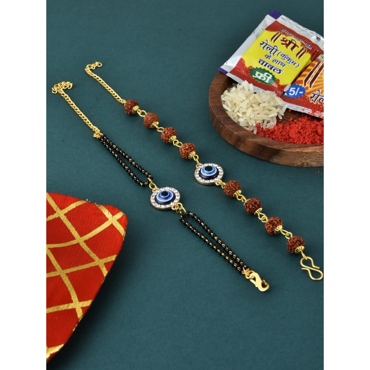 Kalakriti Rakhi for Brother and Bhabhi Combo Set of 2, Evil Eye Rudraksh Rakhi and Mangalsutra Bracelet for Bhabhi With Roli Chawal, Raksha Bandhan Greeting Card and Printed Potli Bag, Blue