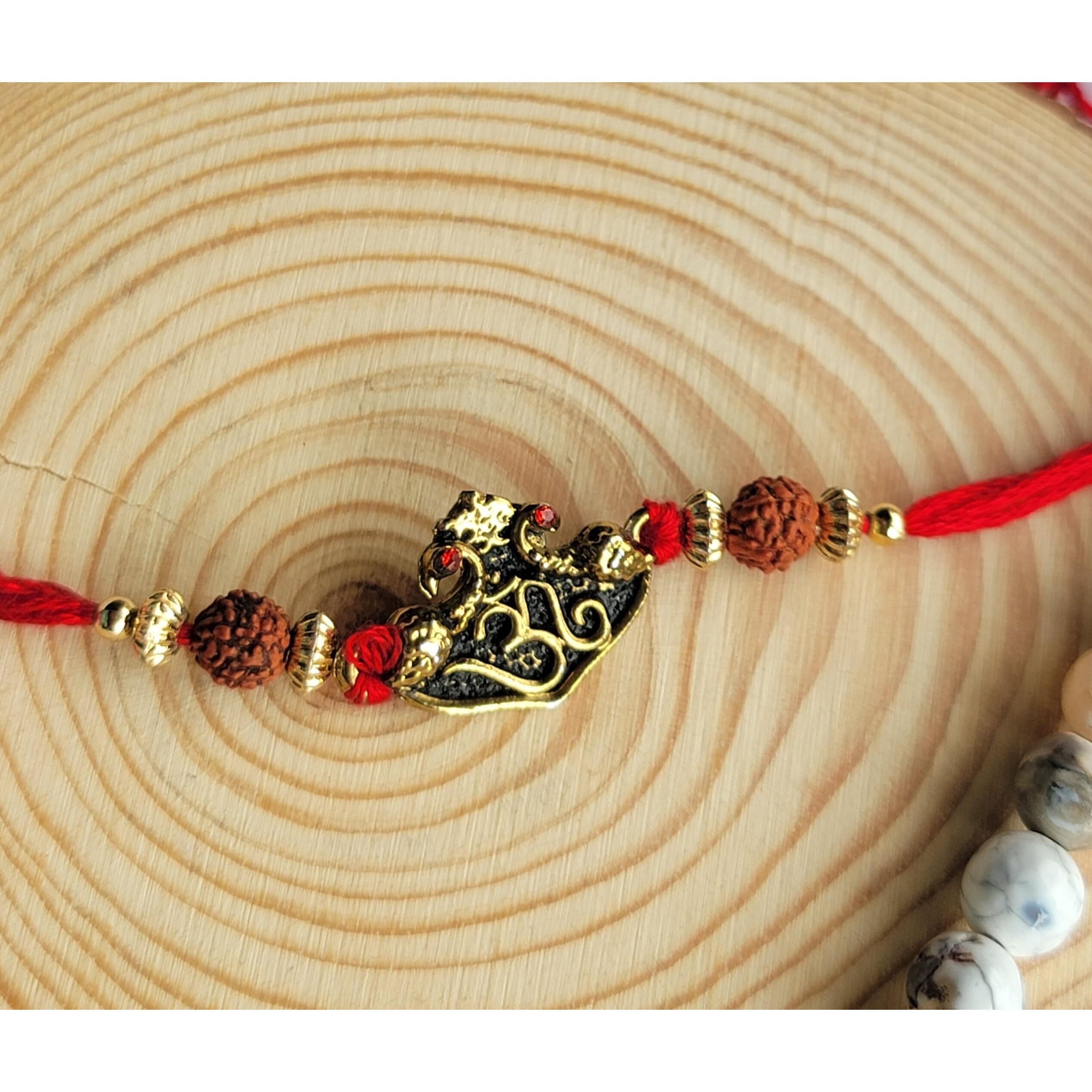 Mahi Gold Plated Purely Divine Om Rudraksh Rakhi Bracelet for Beloved Brothers (RA1100597G)