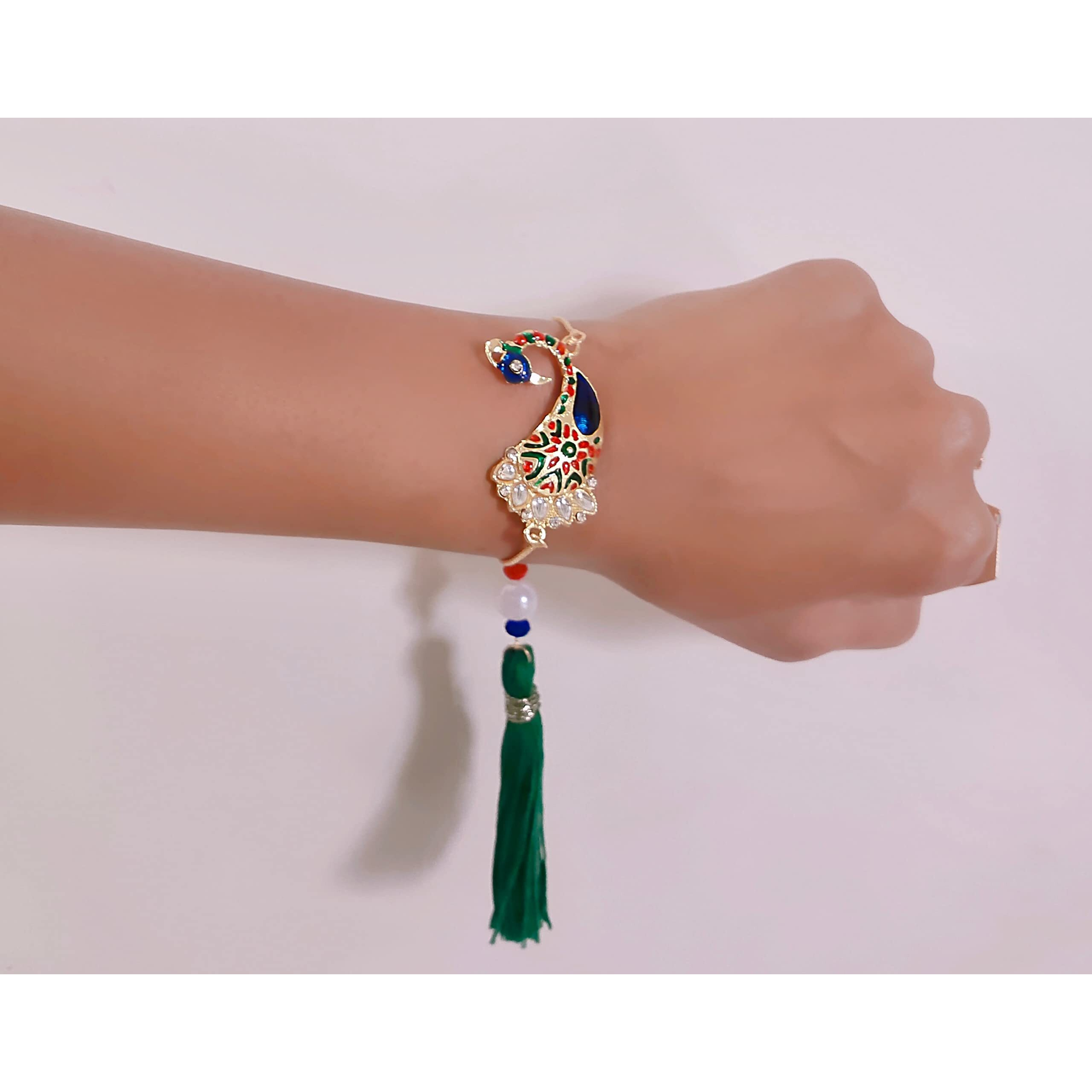 Mahi Peacock Shaped Meenakari Work Lumba Rakhi for Bhabhi (RAL1100679G)