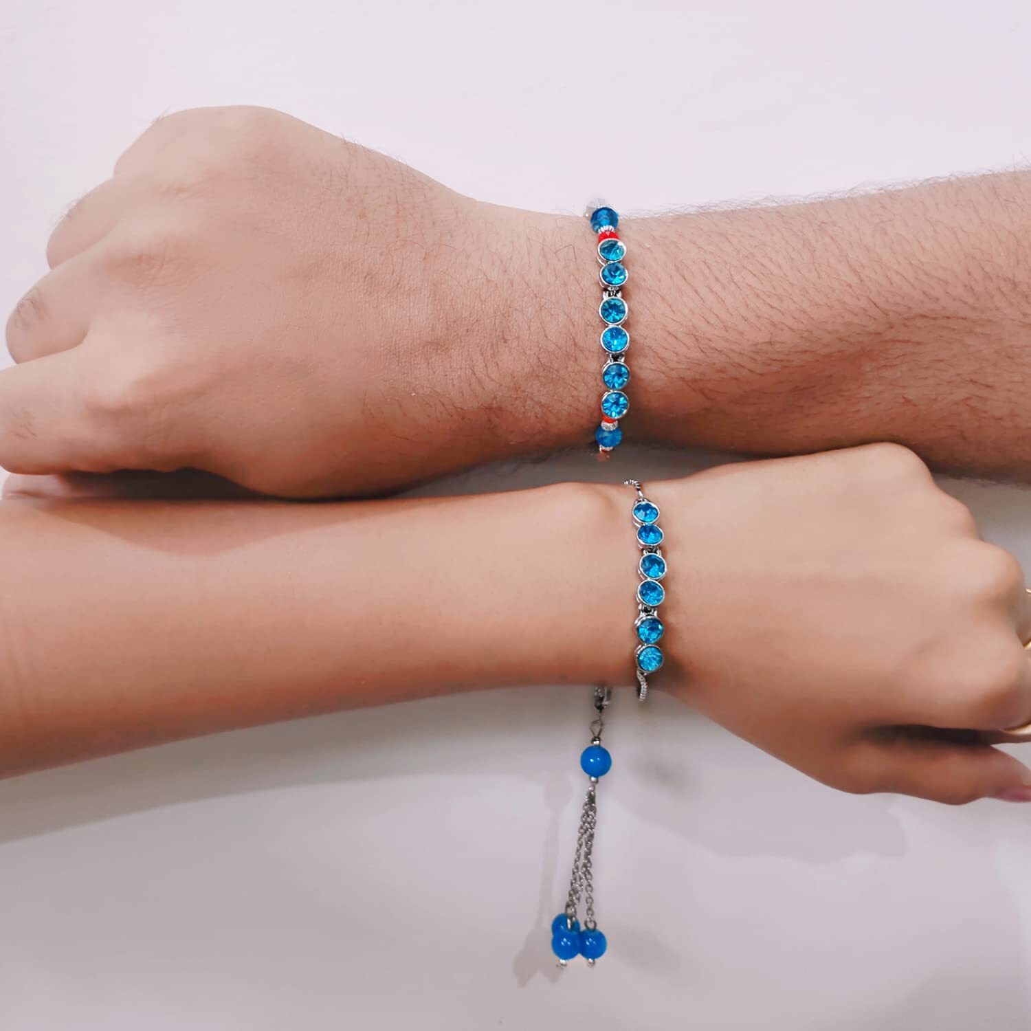 Mahi Rhodium Plated Blue Crystals Rakhi Combo for Men, Women (RCOL1105337M)