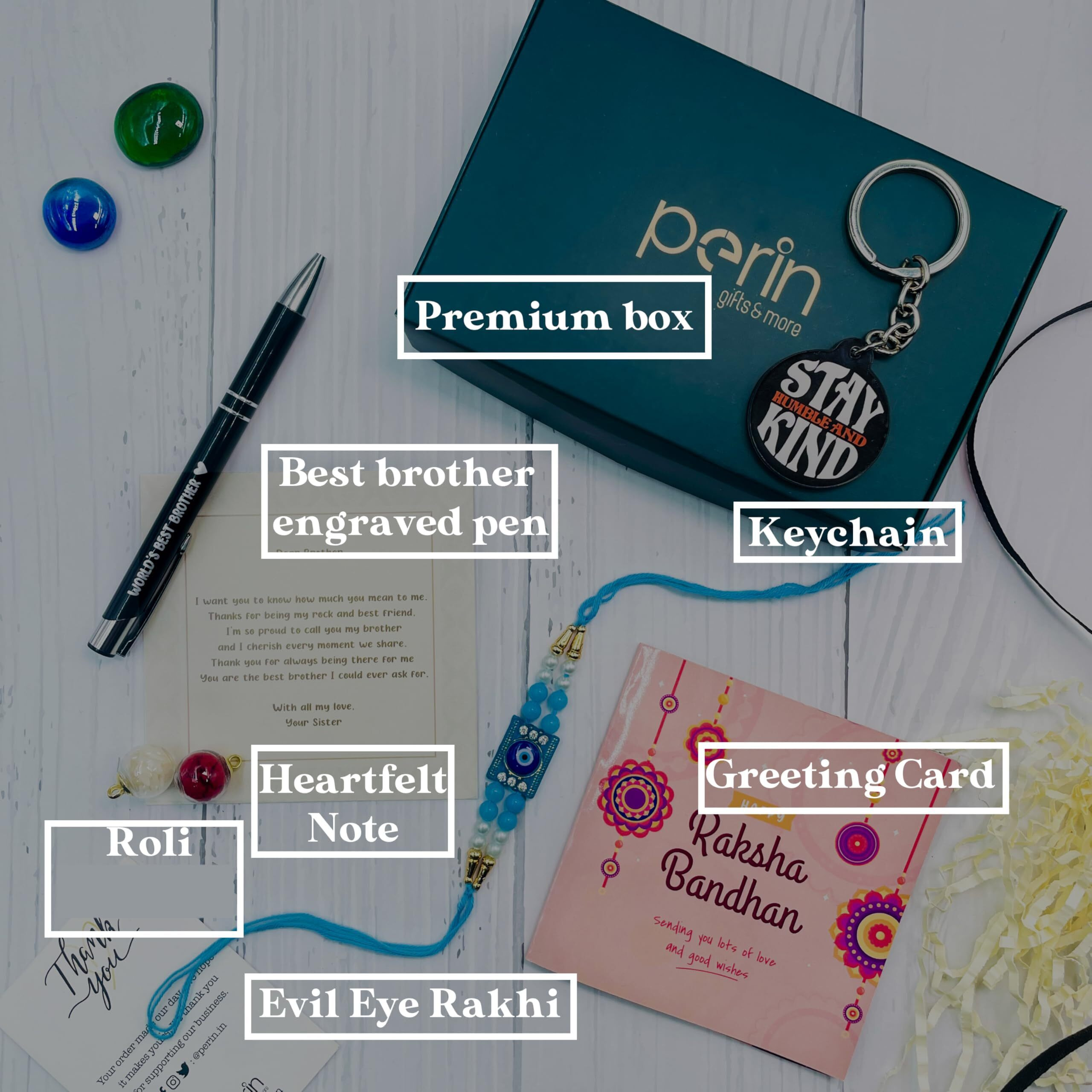 SINCE 7 STORE Rakhi Gift Hamper for Brother - Includes 6 Products Metal Pen which says Worlds Best Brother, Keychain, Rakhi, Set of Roli, Greeting Card & Heartfelt Note from Sister