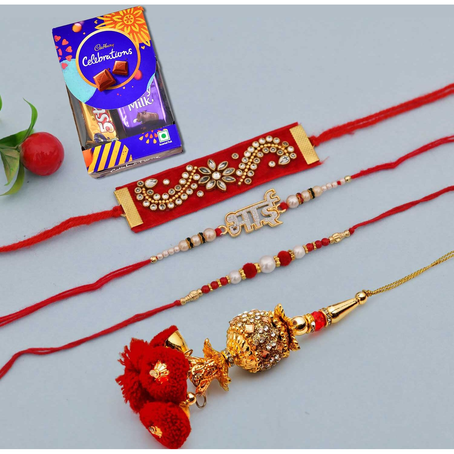 CraftVatika Premium Kundan Rakhi Set of 4 with Cadbury Celebration Chocolates Gift Pack Box, Set of 4 Rakhis For Bhaiya Bhabhi Kwith Rakshabandhan Greeting Card,Lumba Rakhi for Bhabhi