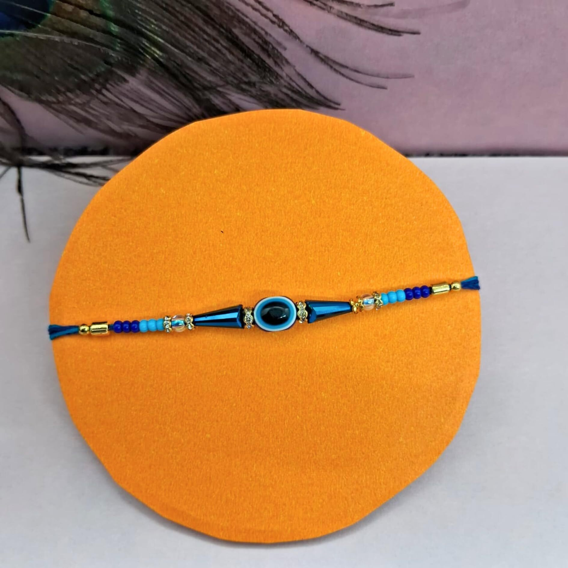 Alaukik Attractive Blue Evil Eye Rakhi Bracelet Set Of 3 For Bhaiya and Bhabhi