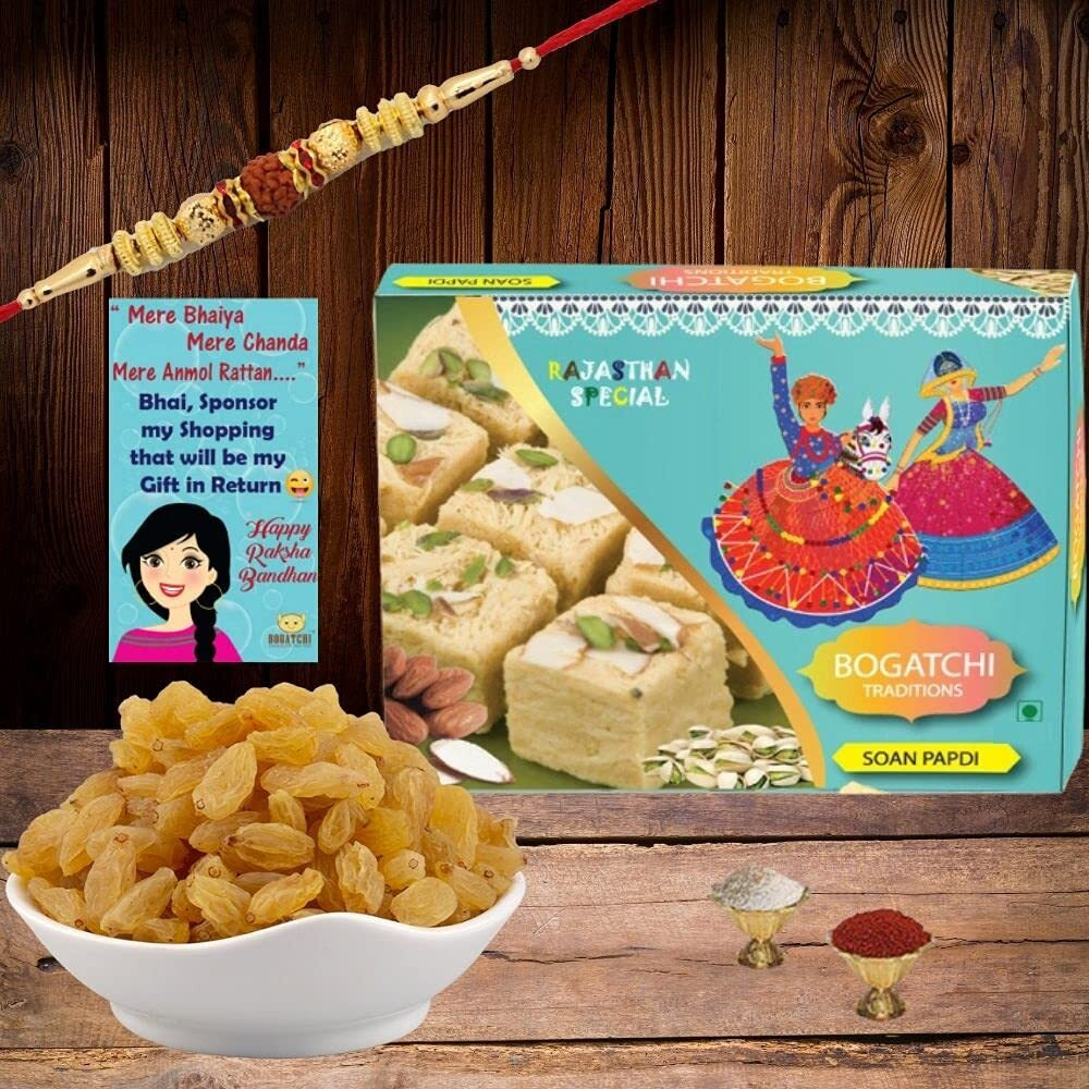 BOGATCHI Complete Rakhi Gift Set Sweets and Dry Fruits for Brother, Traditional Soan Papdi(250g) & Natural Raisins (100g) + Free Rakhi Greeting Card + Free Rakhi + Roli Chawal