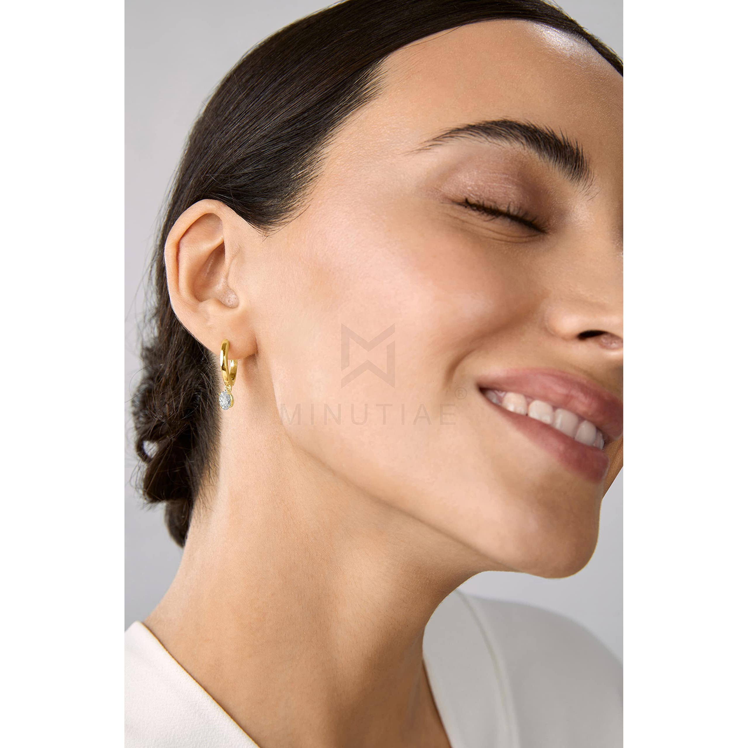 MINUTIAE Oval Shape Solitare Dangling Clip On Earring Austrian Zirconium Earring For Women And Girls ( Gold Plated)