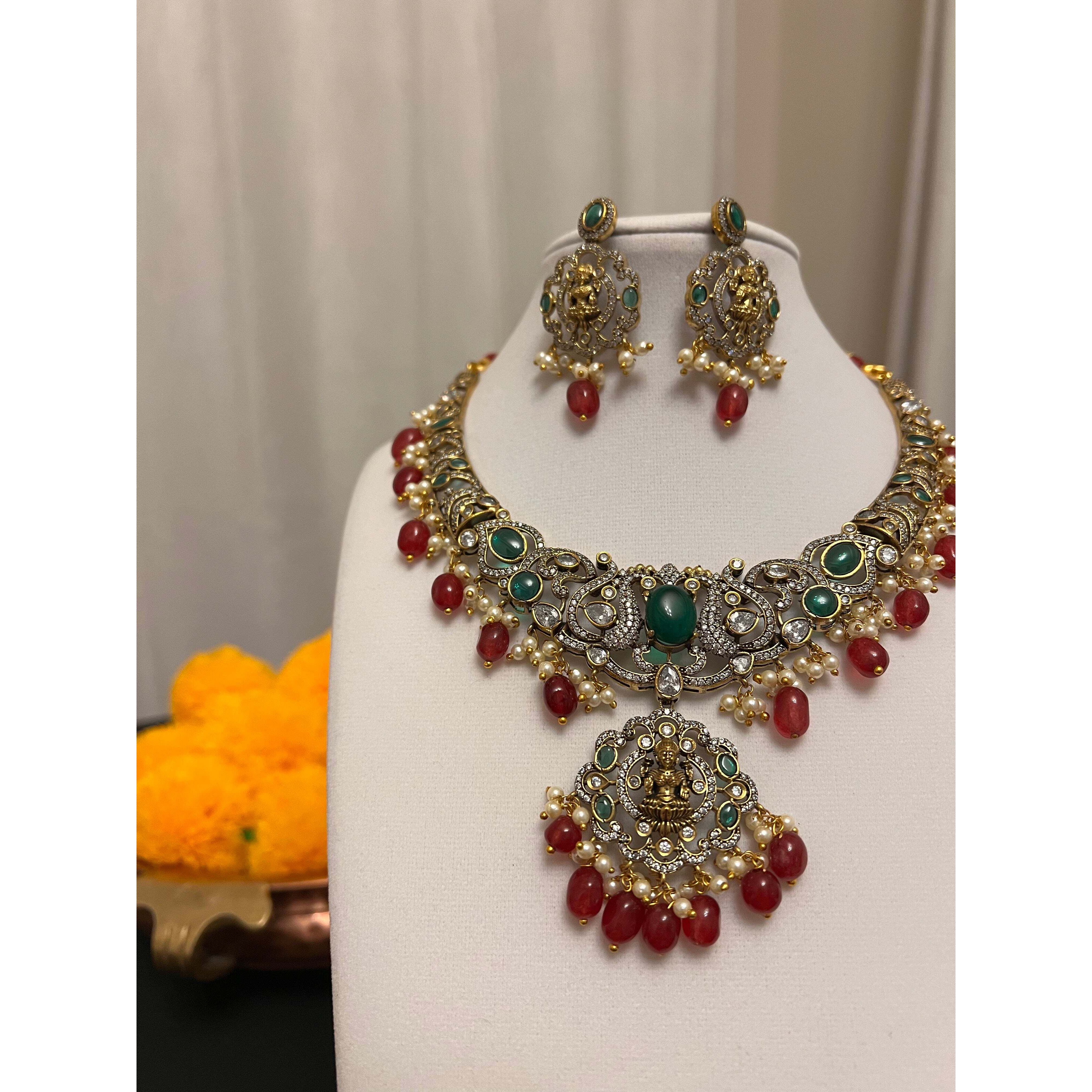 Victorian finish choker ith Maa Laxmi motif necklace set | Red and green stones necklace earring set | Choker / bib necklace