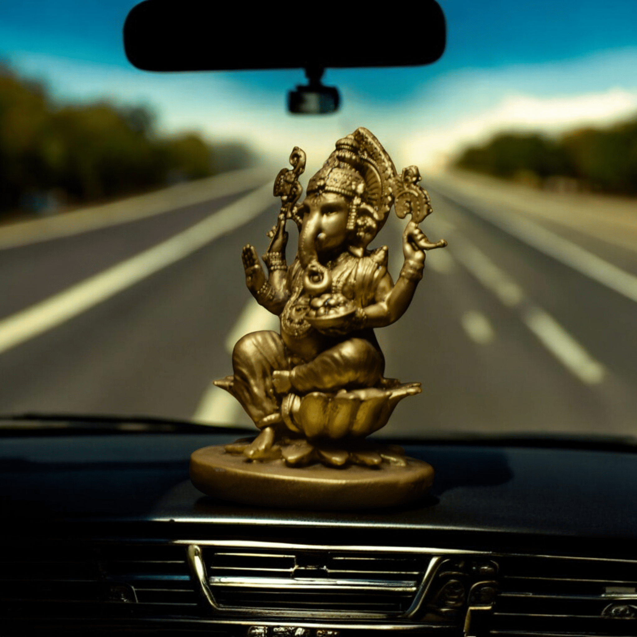 Ganpati Bappa on Lotus - Car dashboard