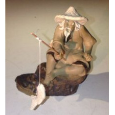 Bonsai Boy e3278 Ceramic Figurine - Mud Man Sitting On A Rock Fishing