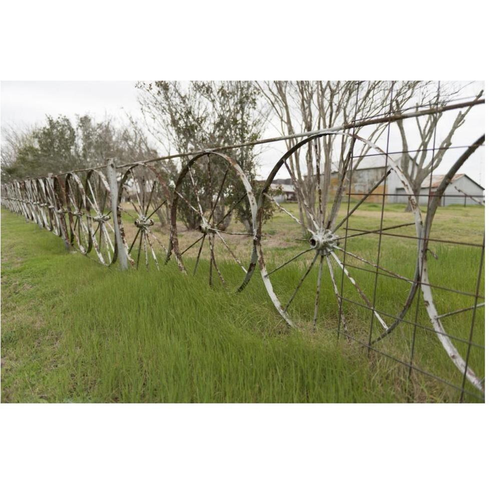 A fence made of wagon wheels near Schulenburg in Fayette County, TX-Paper Art-62&quotx42"